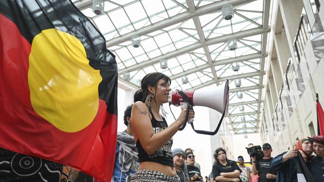 Sovereignty Day protesters breached AFP lines and marched to the forecourt of Parliament House in Canberra. Picture: NCA NewsWire / Martin Ollman