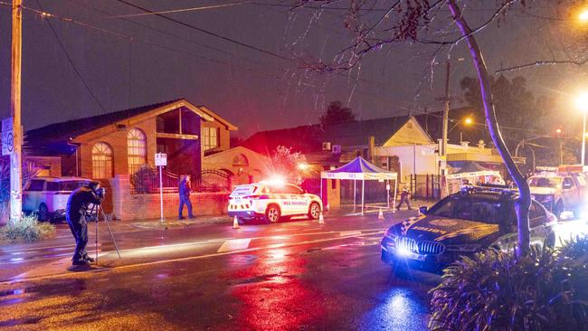 Police on the scene at Neerim Road, Glen Huntly, where a 14-year-old schoolboy was allegedly abducted and left with life-threatening injuries. Picture: Wayne Taylor.