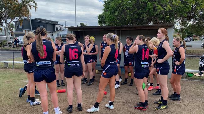 The Tteed Coolangatta girls rally at a break.