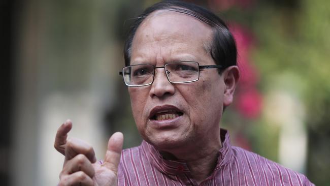 Bangladesh Bank Governor Atiur Rahman who resigned Tuesday gestures as he speaks during a press conference in Dhaka, Bangladesh, Tuesday, March 15, 2016. The head of Bangladesh's central bank resigned on Tuesday, after hackers managed to divert $101 million from the country's account with the Federal Reserve Bank in New York. (AP Photo/ A.M. Ahad)