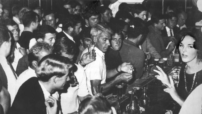 Customers waiting to be served before 6pm closing at a Melbourne hotel in the 1950s.