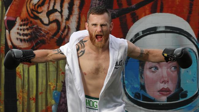 Dennis Hogan was “glad” he was late for an open workout at a Newcastle shopping centre on Sunday. Picture: Annette Dew