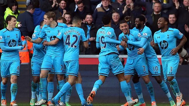 British authorities have charged three football fans with using a derogatory term for Jews at Tottenham matches.
