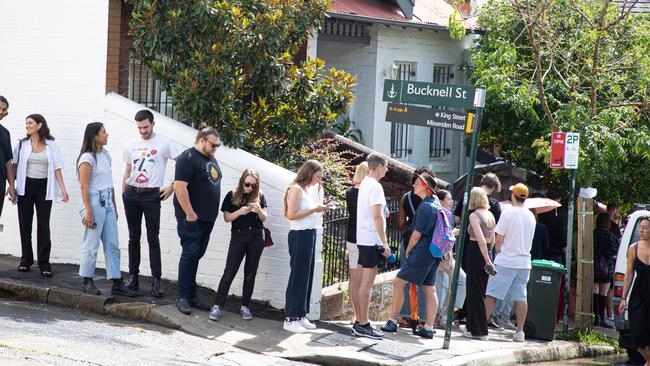 A long line of people waiting to inspect rental accommodation, snakes around the block, in Newtown. There is a rental housing shortage many cities around Australia. Picture: Chris Pavlich