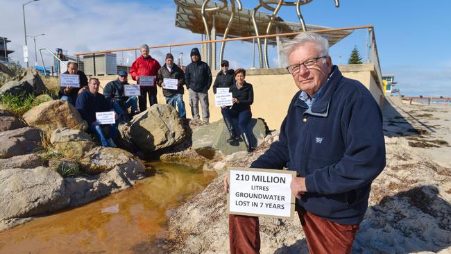 The Western Adelaide Coastal Residents Association has previously protested the water being flushed out to sea. Picture: AAP/Brenton Edwards