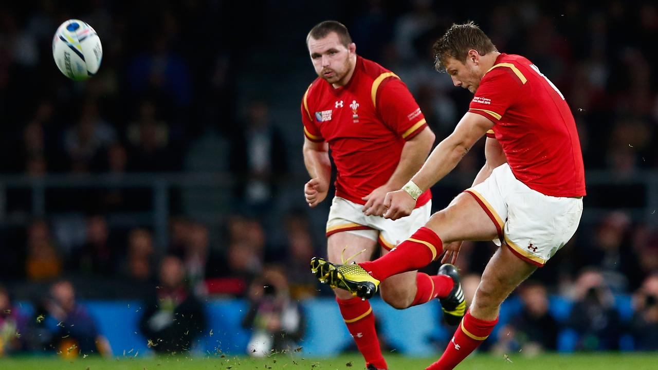 Dan Biggar of Wales kicks a penalty during the 2015 Rugby World Cup.