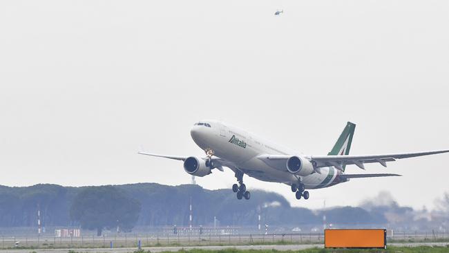 The Alitalia plane carrying Pope Francis takes off from Rome's Fiumicino airport for his trip to Iraq. Picture: AFP