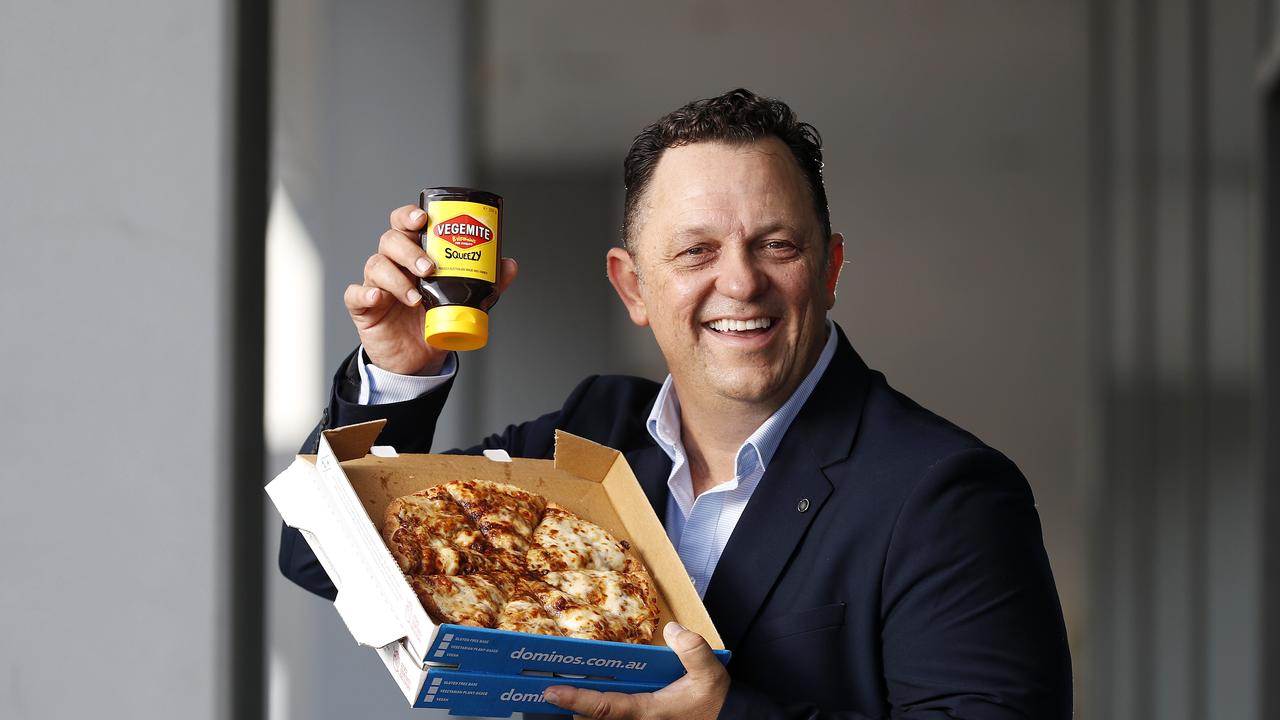 Dominos Australia and New Zealand CEO David Burness with their Cheesy Vegemite pizza launching Monday October 11th, Brisbane 7th of October 2021. (Image/Josh Woning)