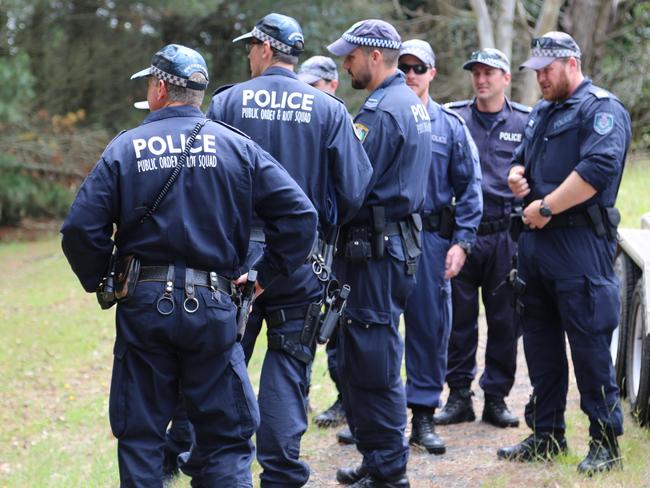 Officers prepare to search the property. Picture: NSW Police