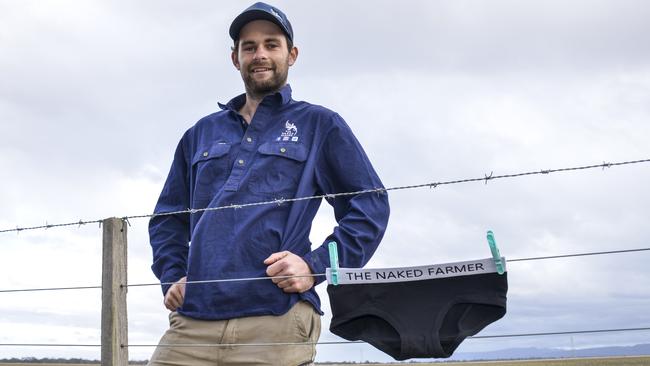 Ben Brooksby, creator of The Naked Farmer, St Helens Plains, with underwear he sells and donates to charity. Picture: Dannika Bonser