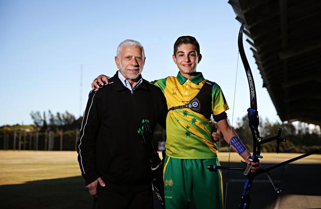 Giorgio with his grandfather Giorgio Vasiliades, a former champion weightlifter, at Sydney Olympic Park Archery Park. Picture: Adam Yip