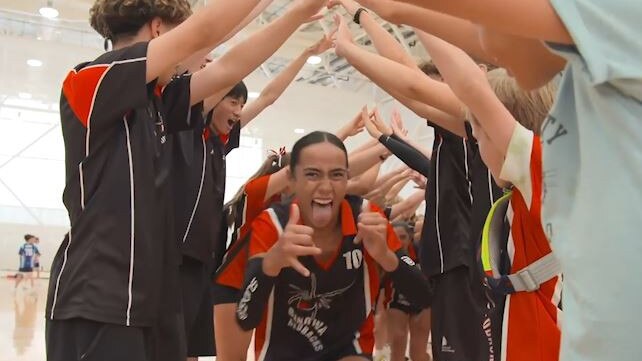 The Benowa State High School Year 8 girls team celebrates after their triumph in the Australian Volleyball Schools Cup in December. Picture: Volleyball Australia