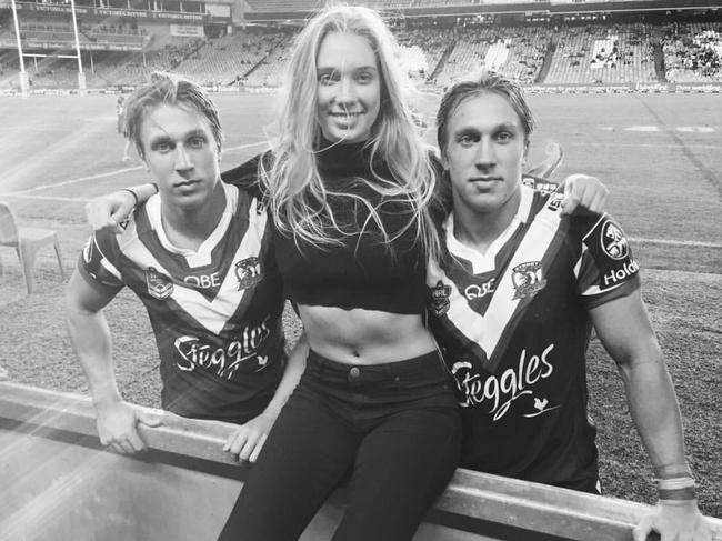 Sarah Marschke (centre) with brothers, Jesse (left) and Ben (right) at Sydney Roosters NRL game. Photo supplied.