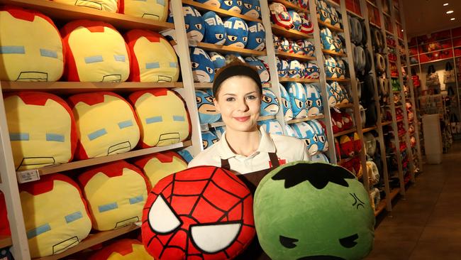 Employee Megan Scroope with some of the merch at the Marvel-themed Miniso store at Highpoint. Picture: Hamish Blair