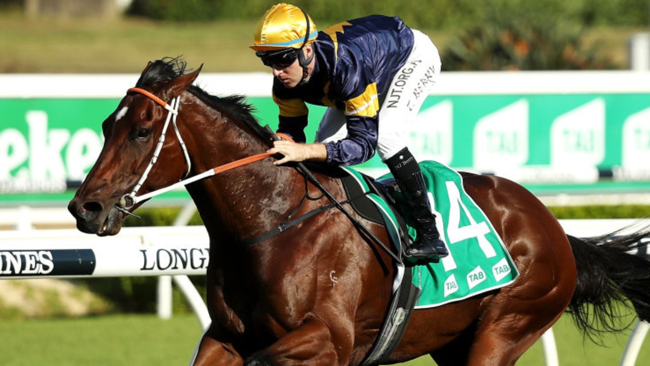 SYDNEY, AUSTRALIA - MAY 09: Tommy Berry rides Masked Crusader to victory in race five Masters Builders Association NSW Benchmark 78 Handicap during Sydney Racing at Royal Randwick Racecourse on May 09, 2020 in Sydney, Australia. (Photo by Mark Kolbe/Getty Images)