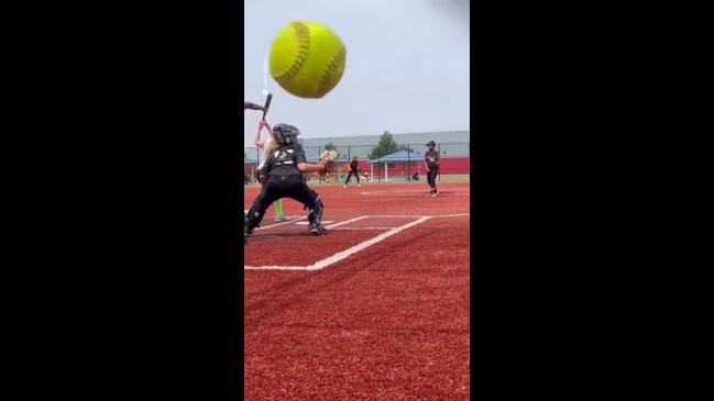 Foul ball hits mother's phone