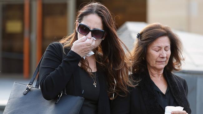 Daughter, Maria, left, and sister, Rosa Warner, of North Hobart shopkeeper Voula Delios leave the Supreme Court in Hobart. Picture: SAM ROSEWARNE.