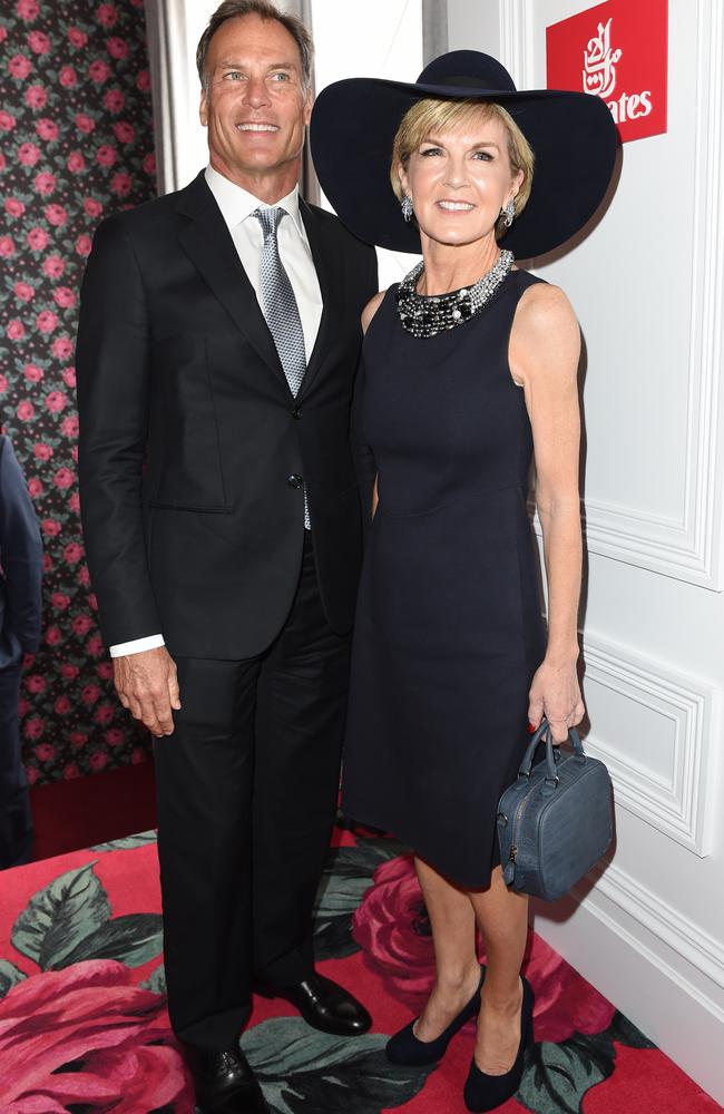 Foreign Affairs minister Julie Bishop and David Panton in the Birdcage on Melbourne Cup Day in Flemington Tuesday Nov. 3, 2015. Picture: AAP Image/Tracey Nearmy