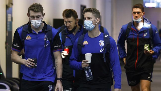 Bailey Dale, Jack Macrae, Lachie Hunter and Jordon Sweet at Melbourne Airport. Picture: Daniel Pockett/Getty Images