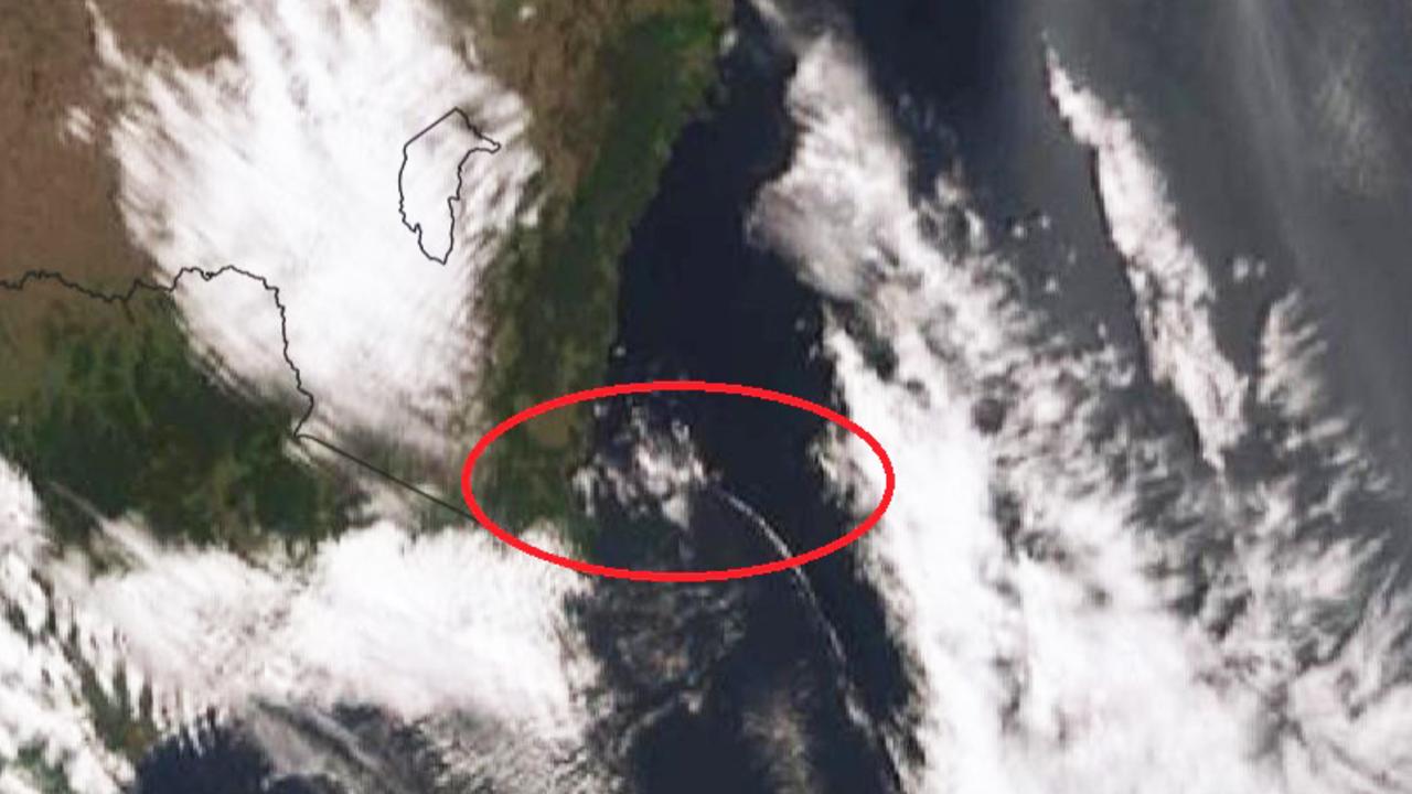 The southerly buster can bee seen in this satellite image as a thin white line of cloud stretching from the coast of southern NSW heading north. It brings with it a huge change in wind direction, the most dangerous time for bushfires to flare up. Picture: BOM.