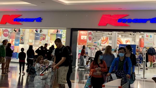 People waiting to enter Kmart at Westfield Chermside on Tuesday. Picture: Danielle O'Neal