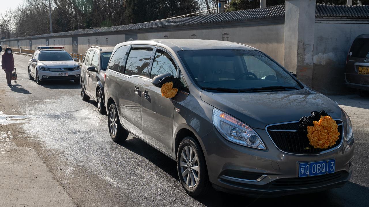 A vehicle decorated with traditional funeral adornments outside Dongjiao Funeral Parlour, reportedly designated to handle Covid fatalities, in Beijing on December 19. Picture: Bloomberg