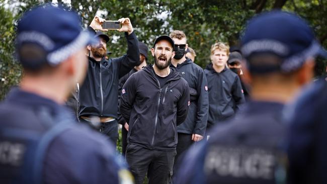 Sewell faces off against riot squad police with members of his neo-Nazi group on Australia Day. Picture: Sam Ruttyn