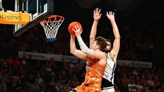 Taipans' Sam Waardenburg and Adelaide's Isaac Humphries go head to head in the National Basketball League (NBL) match between the Cairns Taipans and the Adelaide 36ers, held at the Cairns Convention Centre. Picture: Brendan Radke