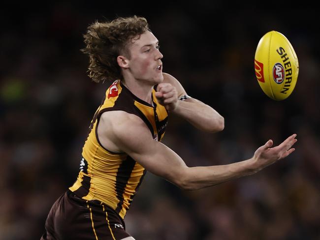 MELBOURNE, AUSTRALIA - JULY 30: Josh Weddle of the Hawks handballs during the round 20 AFL match between Hawthorn Hawks and St Kilda Saints at Marvel Stadium, on July 30, 2023, in Melbourne, Australia. (Photo by Darrian Traynor/Getty Images)