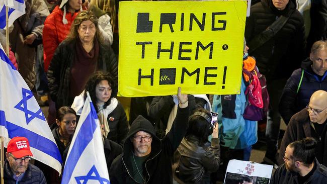 Protesters rally in a call for action to secure the release of Israeli hostages outside the Defence Ministry headquarters in Tel Aviv. Picture; AFP.