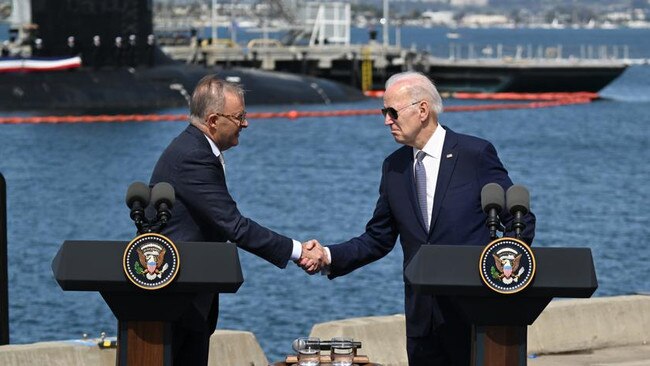 Prime Minister Anthony Albanese and US President Joe Biden shake hands on the AUKUS Partnership. Mr Albanese is now expected to be invited to a White House state dinner hosted by Mr Biden. Picture: Tayfun Coskun/Anadolu Agency via Getty Images