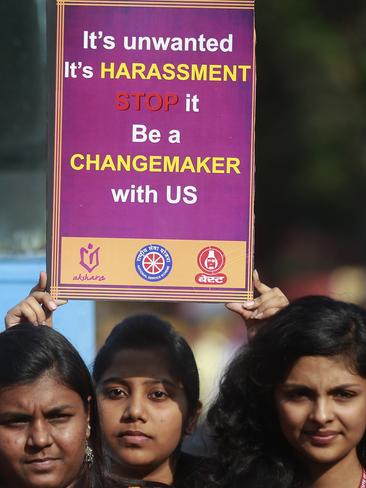 Indian students participate in a rally to mark the second anniversary of the deadly gang rape of a student on a bus in New Delhi, in Mumbai, India, Tuesday, Dec. 16, 2014. The case sparked public outrage and helped make women’s safety a common topic of conversation in a country where rape is often viewed as a woman’s personal shame to bear. (AP Photo/Rafiq Maqbool)