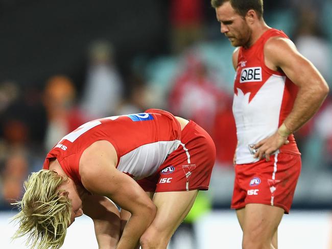 Isaac Heeney and Ben McGlynn react after the siren.