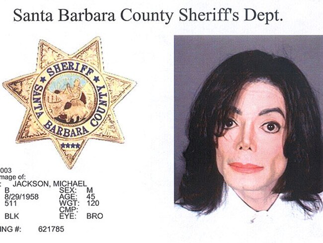 <b>Michael Jackson</b> was photographed by the Santa Barbara County Sheriff's office following his November 2003 arrest for child molestation. The then 45-year-old King of Pop was released after posting $US3 million bail and was acquitted at trial in 2005. Picture: Supplied