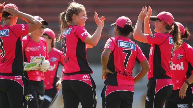 Ellyse Perry celebrates with teammates after dismissing Georgia Redmayne on Friday. Pic: Getty Images