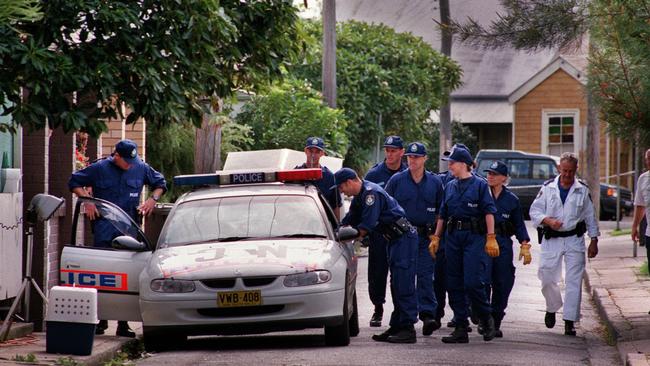 Police outside house at 87 Doran St, Carrington, where the bodies of two women were discovered on May 17 2000. Their deaths remain unsolved. Picture: Robert McKell.