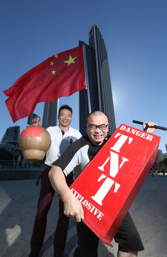 SeaFire is back and the Chinese team that won last year's fireworks comp is taking on the Philippines this time. Dale Chen and Leo Liu, members of the Chinese team, with their rockets on the Surfers Paradise beach where Seafire will be held. Picture Glenn Hampson