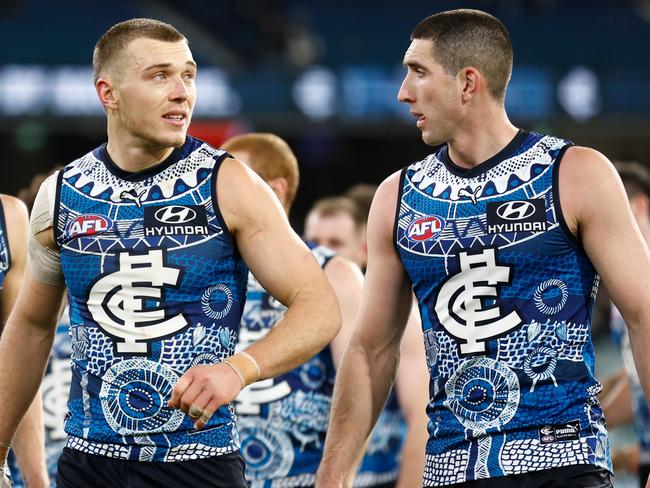 MELBOURNE, AUSTRALIA - MAY 21: Patrick Cripps (left) and Jacob Weitering of the Blues look dejected after a loss during the 2023 AFL Round 10 match between the Carlton Blues and the Collingwood Magpies at the Melbourne Cricket Ground on May 21, 2023 in Melbourne, Australia. (Photo by Michael Willson/AFL Photos via Getty Images)