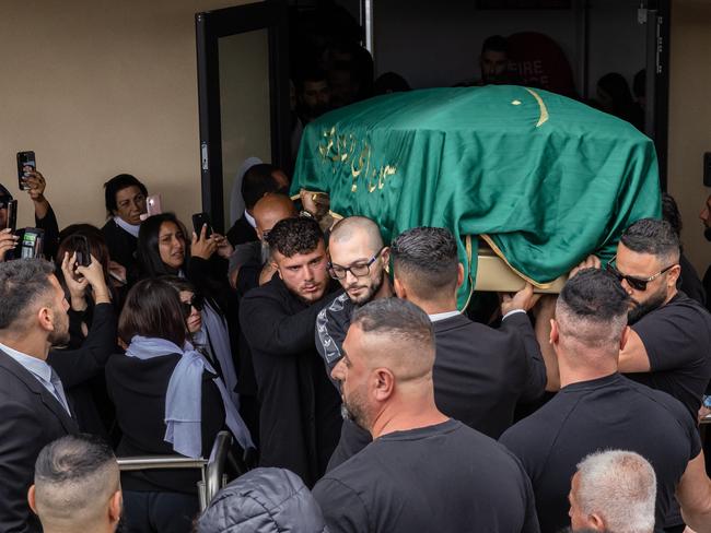 Mourners farewell Sam Abdulrahim.