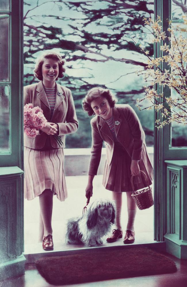 Princesses Elizabeth (left) and Margaret with their dog Chung at the Royal Lodge at Windsor. Picture: Hulton-Deutsch Collection/CORBIS/Corbis via Getty Images