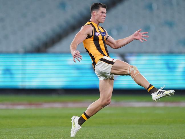 Jaeger OÃ¢â¬â¢Meara of the Hawks kicks the ball during the Round 3 AFL Match between the Richmond Tigers and the Hawthorn Hawks at the MCG in Melbourne, Thursday, June 18, 2020. (AAP Image/Michael Dodge) NO ARCHIVING, EDITORIAL USE ONLY