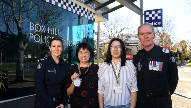 Leading Senior Constable Rebecca Millin, Emily Ma, Eva Lam and Senior Sergeant Ronald Sinclair celebrate the program.