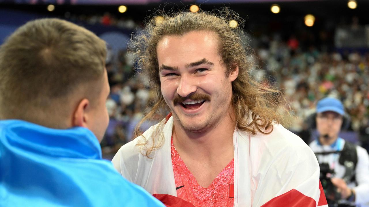 Katzberg after winning gold. Photo by Kirill KUDRYAVTSEV / AFP