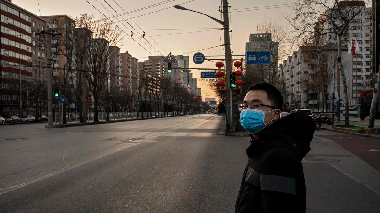 An empty street in Beijing in February as China was in a deep lockdown. Picture: NICOLAS ASFOURI / AFP.