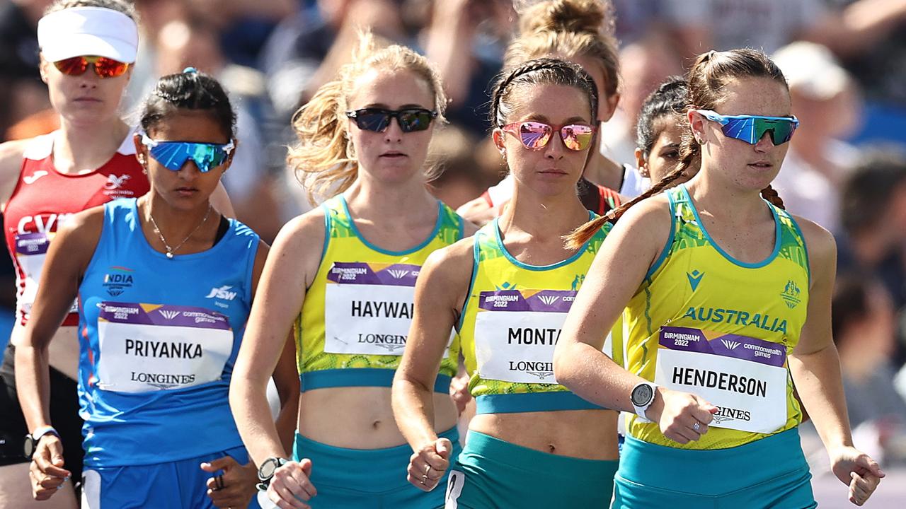 Jemima Montag sits between teammates Rebecca Henderson and Katie Hayward early in the race. Picture by Michael Klein