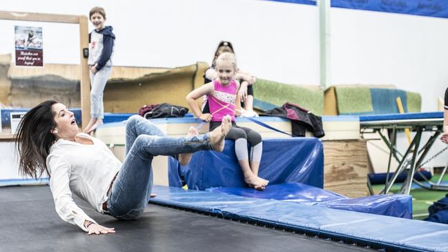 And then it was Jane Howlett’s turn at ignominy as Adalyn Bent, 7, of Old Beach, watches on. Picture: Eddie Safarik