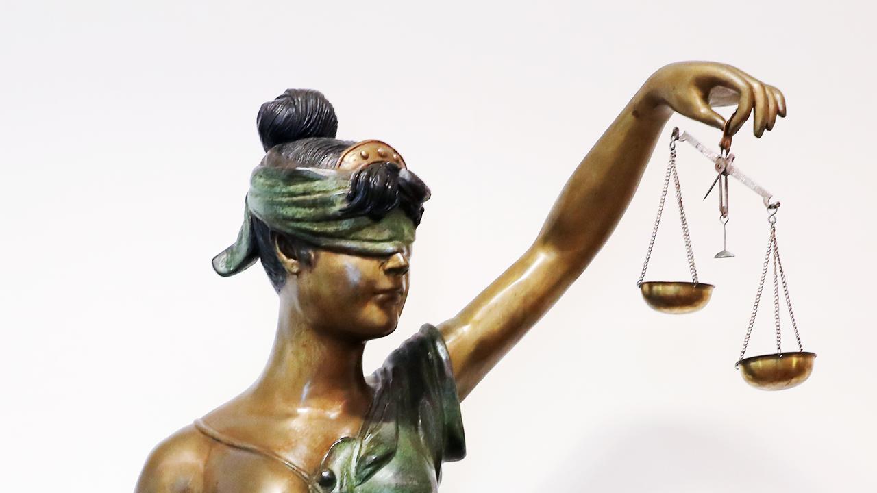 Lady Justice and the scales of justice. Picture: Brendan Radke