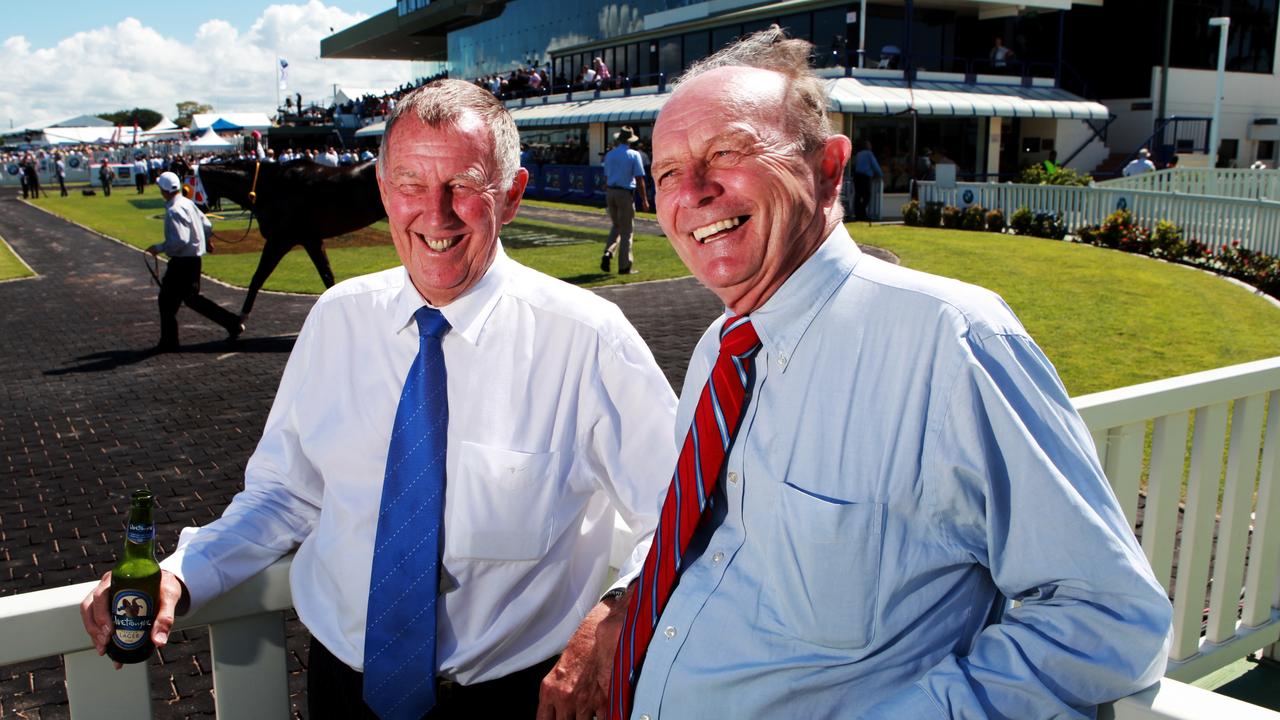 Businessmen John Singleton (L) and Gerry Harvey during the Magic Millions event at the Gold Coast Turf Club in Queensland.