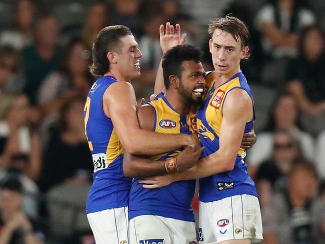 MELBOURNE, AUSTRALIA - APRIL 09: (L-R) Jake Waterman, Willie Rioli and Brady Hough of the Eagles celebrate during the 2022 AFL Round 04 match between the Collingwood Magpies and the West Coast Eagles at Marvel Stadium on April 09, 2022 In Melbourne, Australia. (Photo by Michael Willson/AFL Photos via Getty Images)