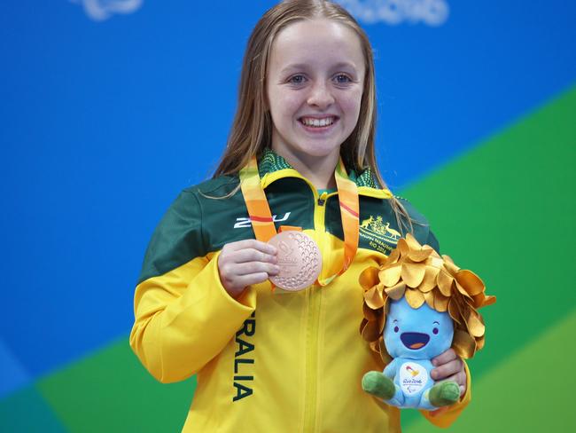 RIO DE JANEIRO, BRAZIL - SEPTEMBER 09: Bronze medalist Tiffany Thomas Kane of Australia celebrates on the podium at the medal ceremony for the Women's 50m Butterfly - S6 on day 2 of the Rio 2016 Paralympic Games at the Olympic Aquatics Stadium on September 9, 2016 in Rio de Janeiro, Brazil. (Photo by Friedemann Vogel/Getty Images)